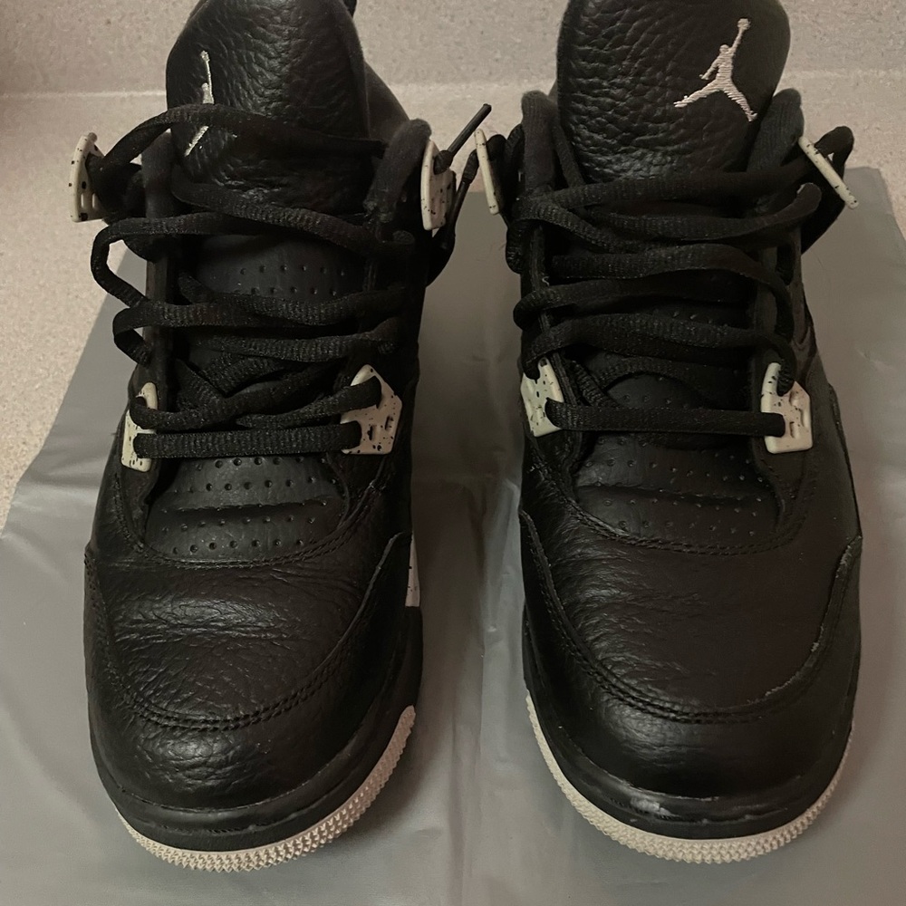 Jordan Kids Black and White Sneakers, needs insoles and is in good condition.